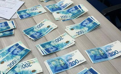 נסעו על קטנוע בצורה מחשידה ונתפסו עם שטרות מזוייפים