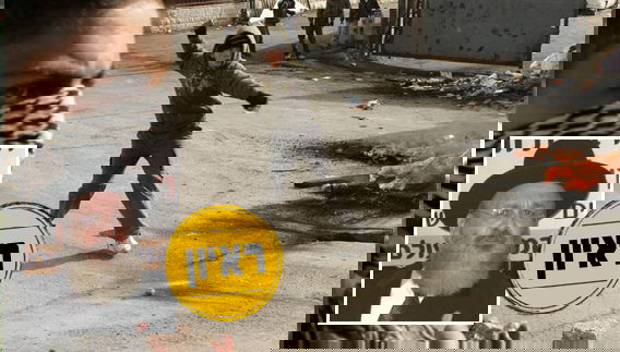 הרב ישר על רקע מהומות (פלאש 90)