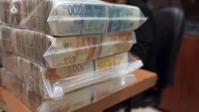 צפו: עשרות מיליוני השקלים שנתפסו בעזה מועברים לבנק ישראל