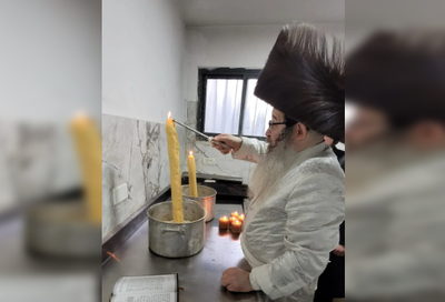 בתוך סיר קוגל | כך הדליק הרבי את 'נר החיים' בערב יום כיפור