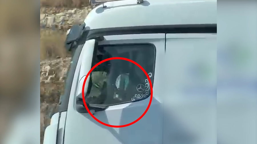 תפיסת נהג המשאית עם הטלפון