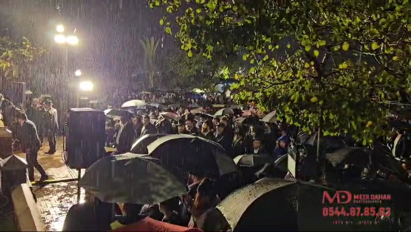 השירה והגשם בהלוויה