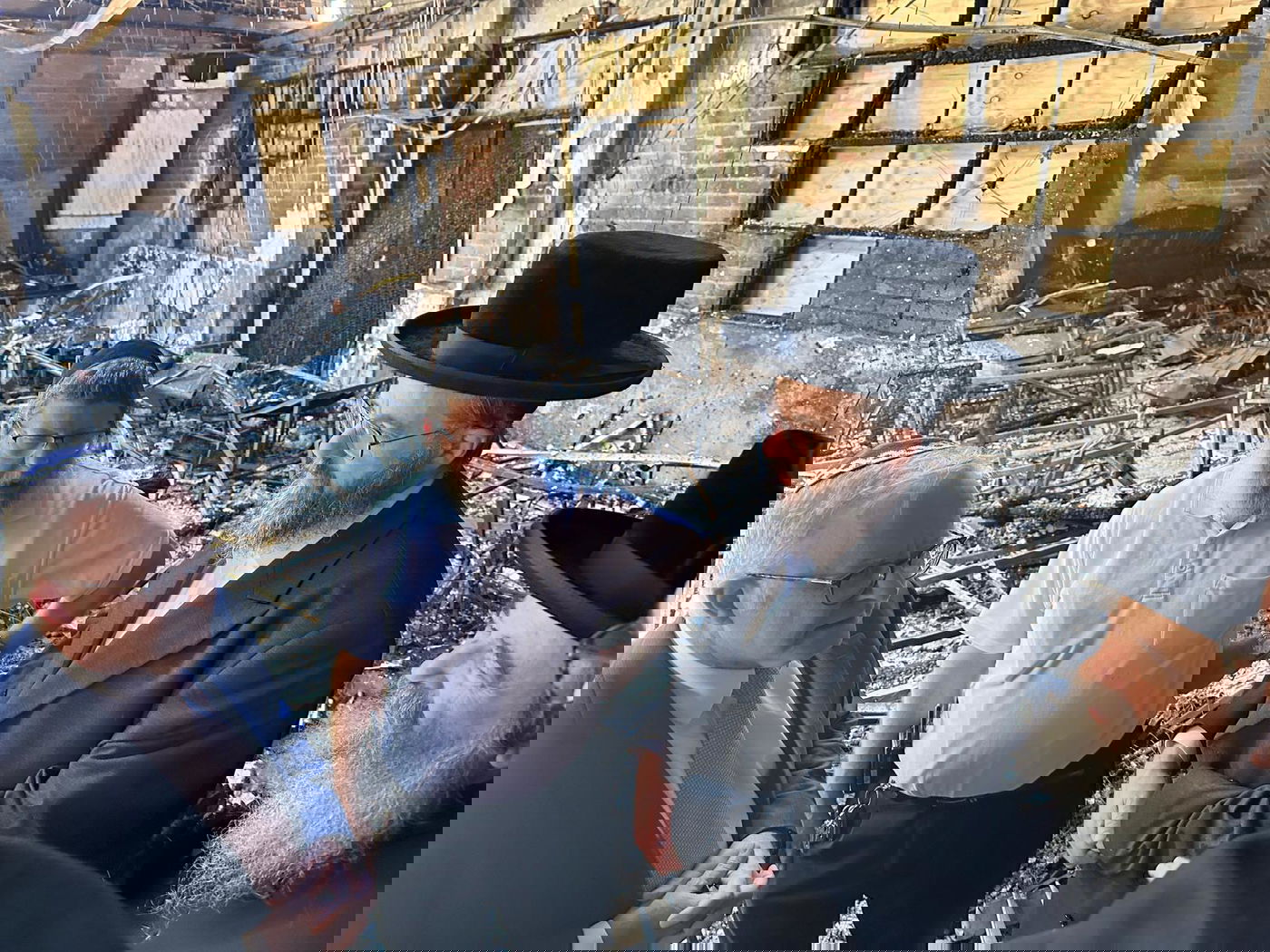 ראש הממשלה האוסטרלי ביקר בבית הכנסת - וספג נאצות