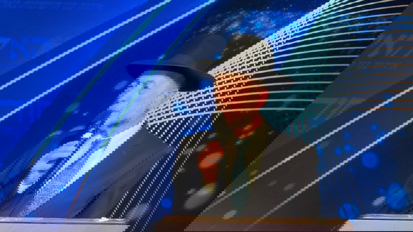 אוקי מקלב נואם בוועידת האיחוד