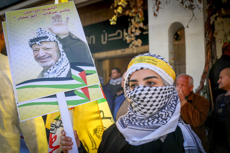 פלסטינית מפגינה במראללה