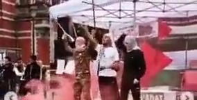 מיצג רחוב מזעזע בבלגיה: מחבלים טובחים באזרחים ב-7.10 ו"משחררים את פלסטין"