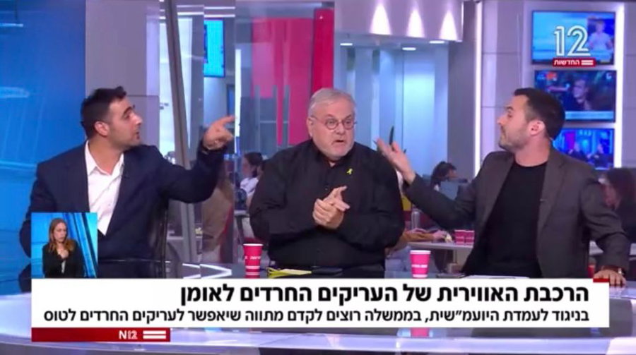 הממשלה מממנת טיסות 'משתמטים' לאומן? העימות של ישי כהן באולפן חדשות 12