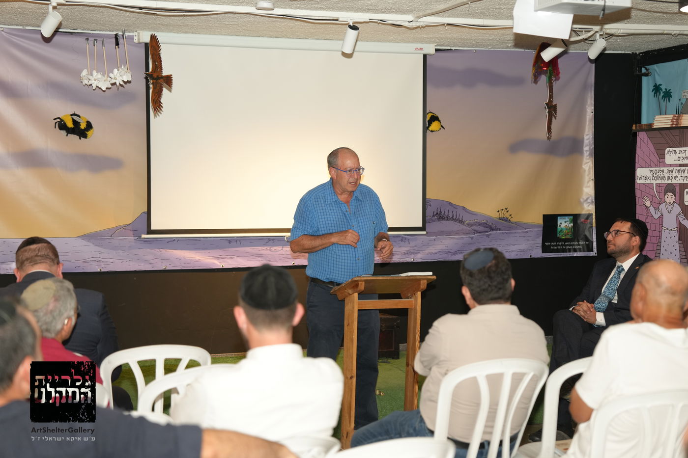 ד"ר חזי הורן נציג 'עמיתים לטיולים' באירוע השקת הספר 'המקומות הנדירים הקדושים והרטובים'