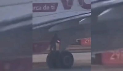 הנוסע הסמוי מטפס אל כן הגלגלים