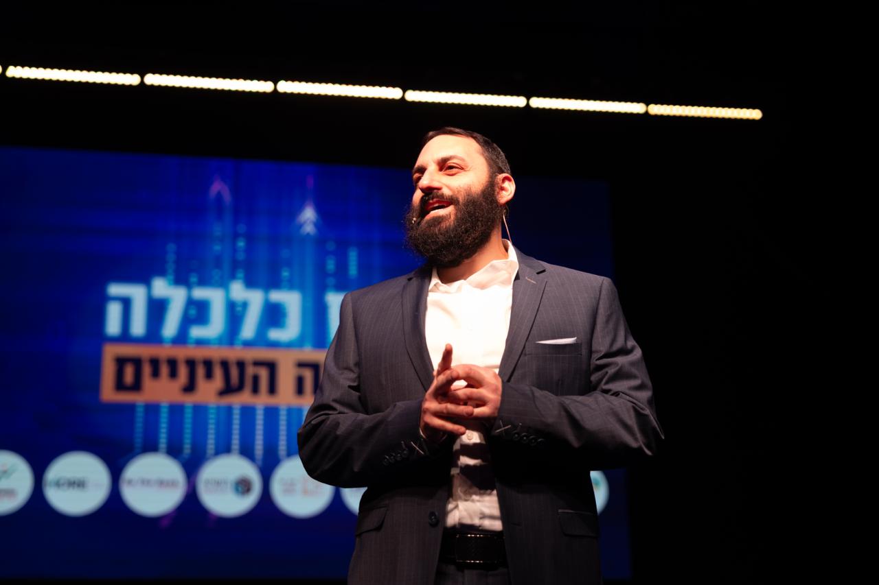 שחר וולף, כלכלן בכיר ומנהל קהילת 'כלכלה בגובה העיניים'