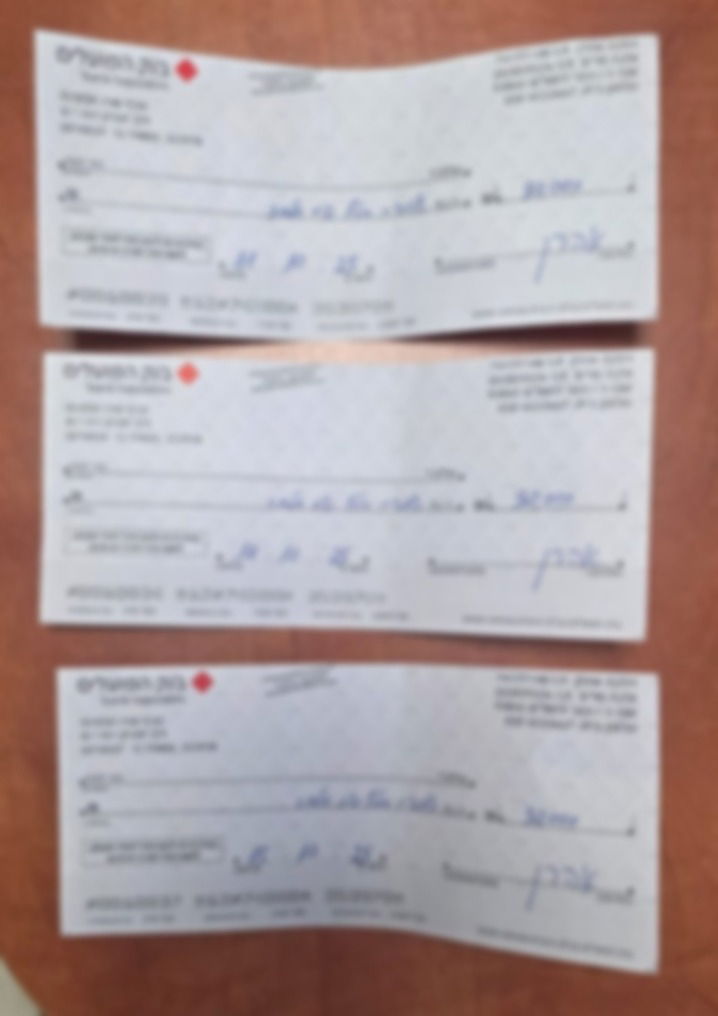 צ'קים על סך 90 אלף ש"ח שנתפסו ברשות החשודים