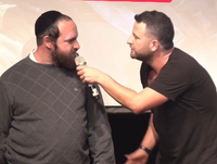 "הפרזנטור של חוק הגיוס": המפגש של גיא הוכמן והלוחם החרדי על הבמה | צפו