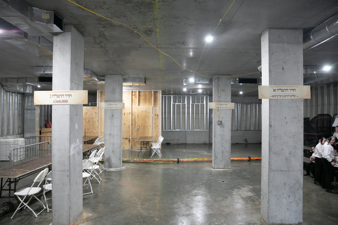 מעמד יציקת הבורות לביהמ"ד סאטמר בשכונת ווערנאן בוויליאמסבורג