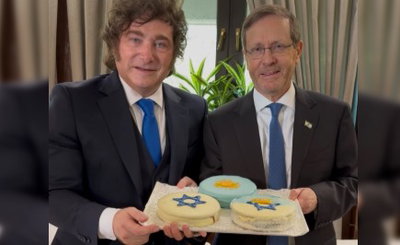 עם עוגיות: כך קיבל נשיא ארגטינה מיליי את העיטור האזרחי הגבוה ביותר