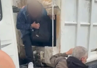 פרשת משאית הזבל: הרגע שבו נמצאו בפנים דחוסים 33 איש | צפו