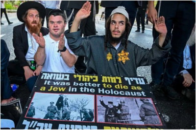 טלאי צהוב ושלטים עם תמונות קשות מהשואה | ההפגנה הסוערת במרכז הארץ