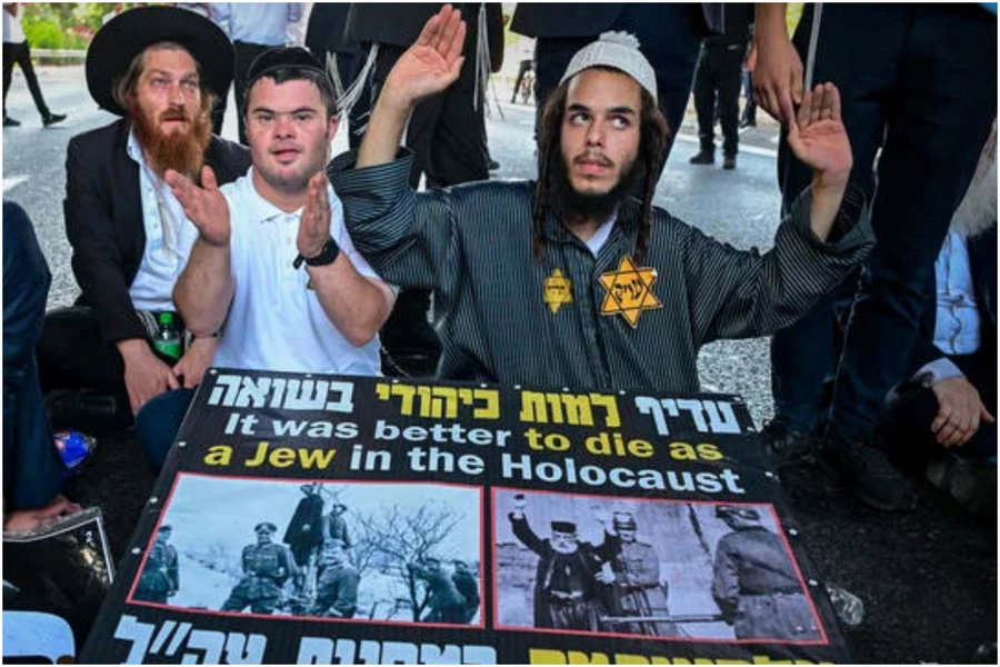 טלאי צהוב ושלטים עם תמונות קשות מהשואה | ההפגנה הסוערת במרכז הארץ